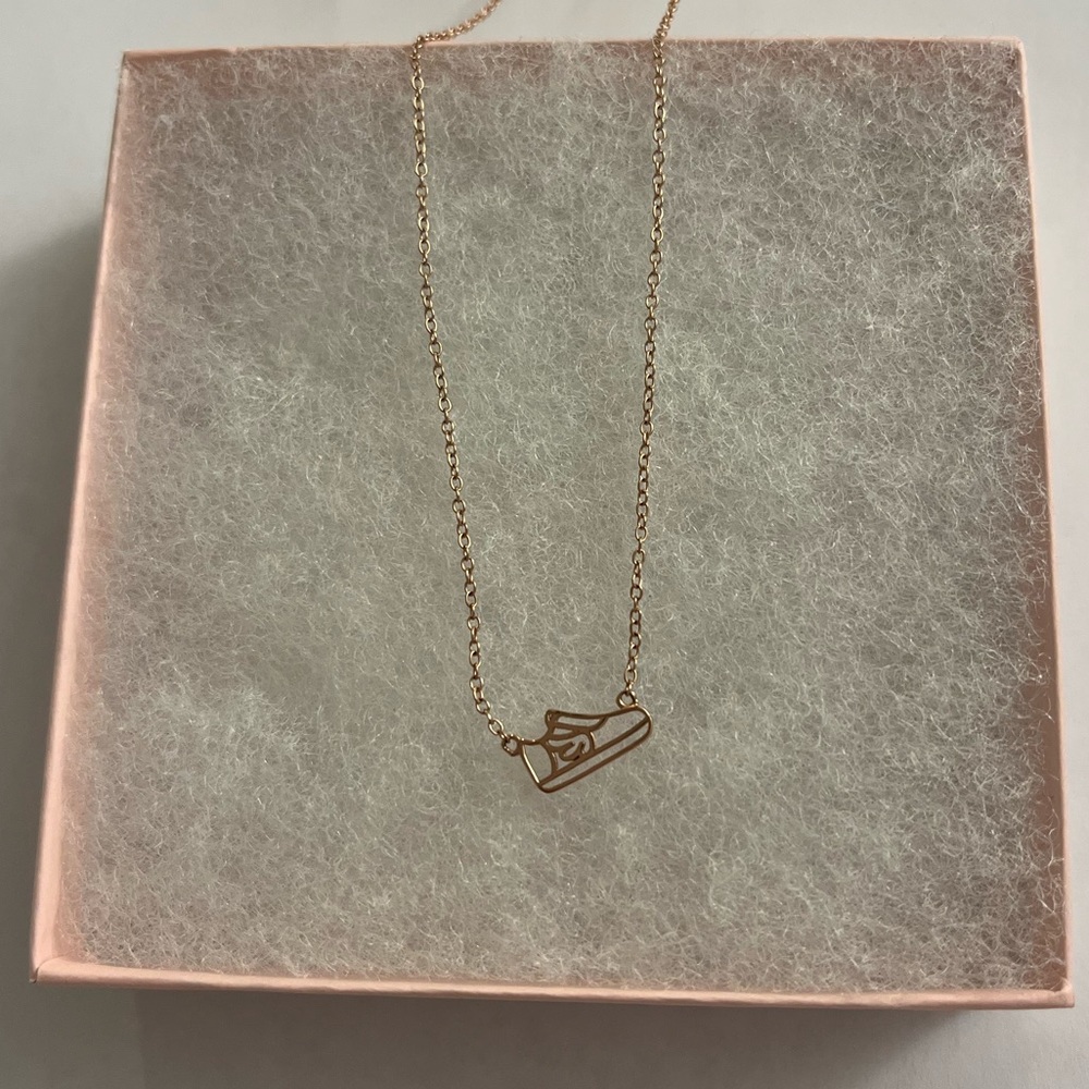 Rose gold track shoe pendant necklace